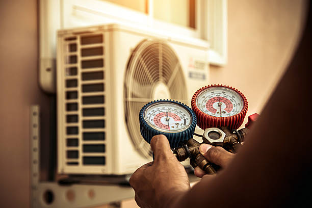 Professional Air Conditioning Service technician working in Spanish Fort, AL